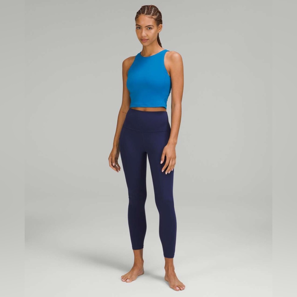 Worn once with zero signs of wear! Fitted top in this rare poolside blue shade